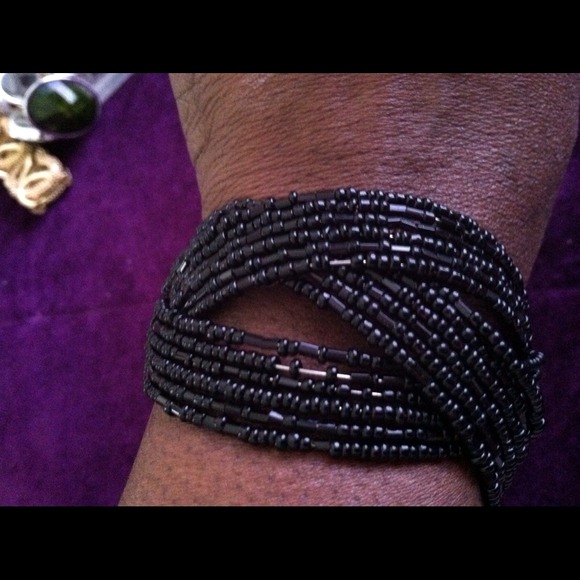 Black beaded cuff bracelet.