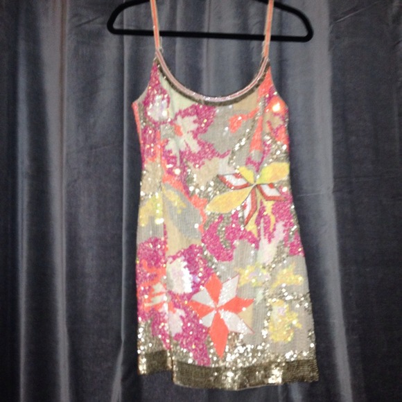 2 Hand embellished dresses