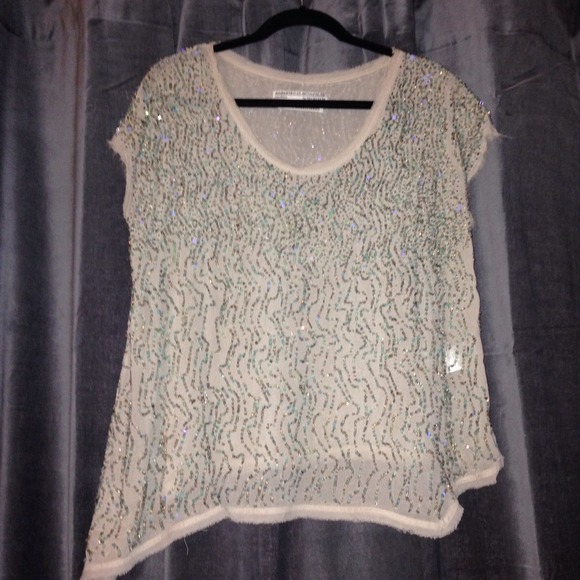 Oil embellishment top