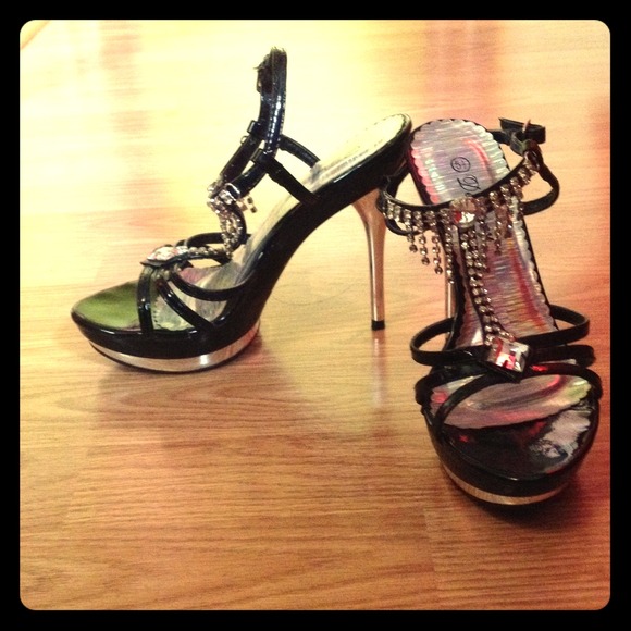 Black and silver high heels with diamond studs.