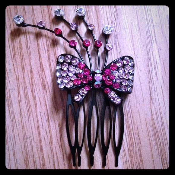A pink butterfly hair decoration