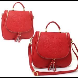 Red unique cross body shoulder and hand bag