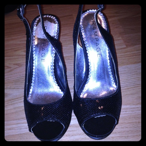 Black high heels with sparkles.