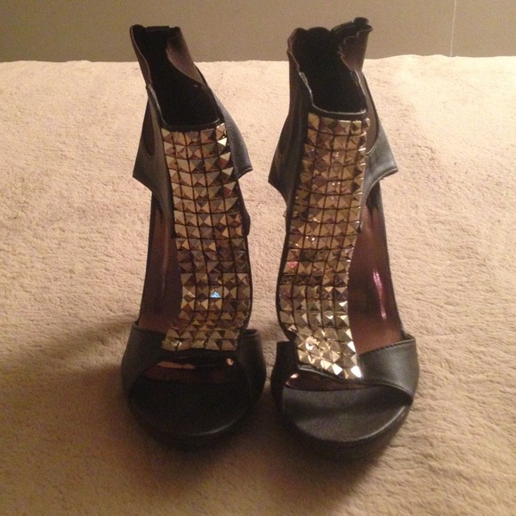 Brown and gold heels