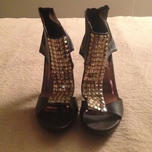 Brown and gold heels