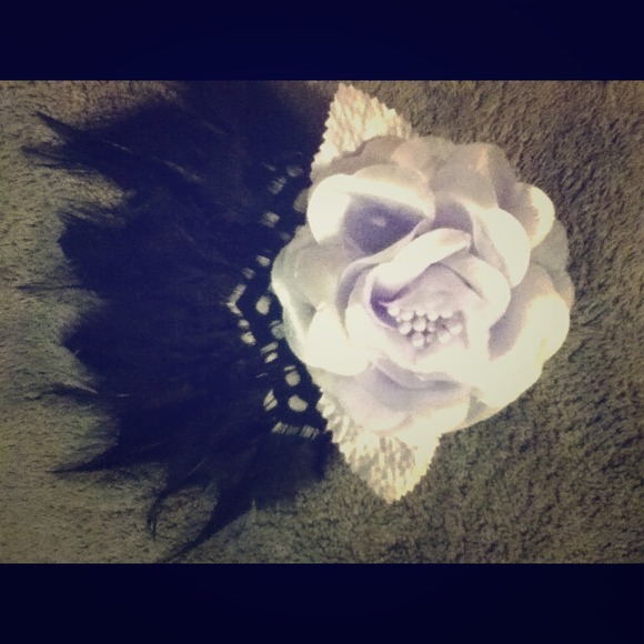 Handmade rose/feather hair accessory.