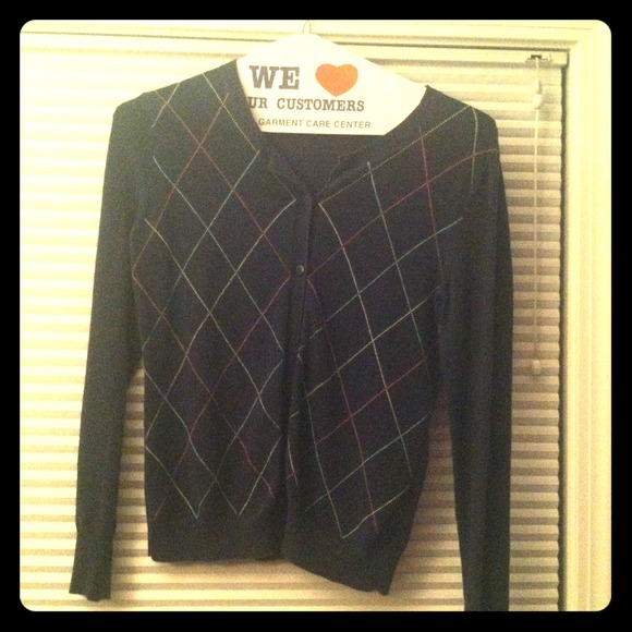 Navy cardigan with colorful argyle pattern