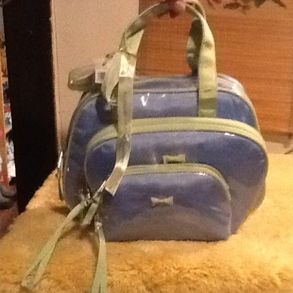 Brand new Liz Claiborne 3 piece cosmetic bag set