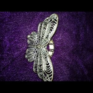 Large butterfly ring.