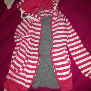 Striped light jacket along with spaghetti shirt