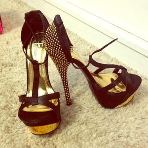 Gold and black pumps from Shoedazzle