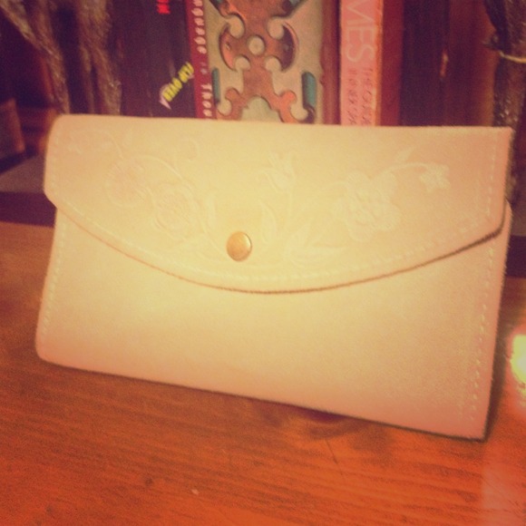 Vintage, soft tan leather wallet.