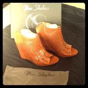 Adorable Leather Wedges.