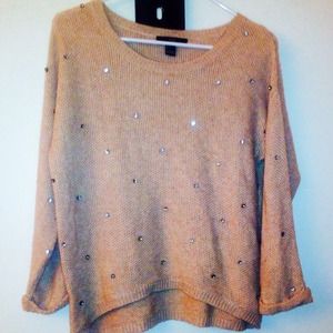 Two over sized over the shoulder sweaters