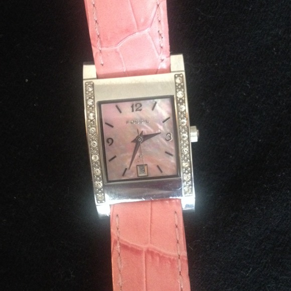 Pink Fossil watch with crystal face