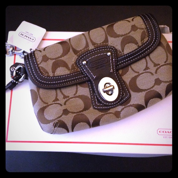 Coach signature hand wristlet