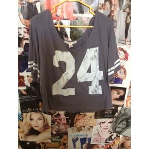 a gray varsity shirt