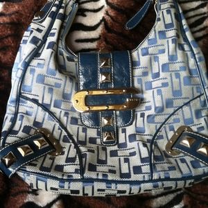 Guess bag. Brand New. Teal accents silver hardware