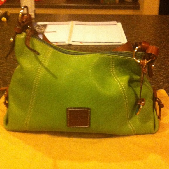 Dark lime green Dooney & Burke  handbag.