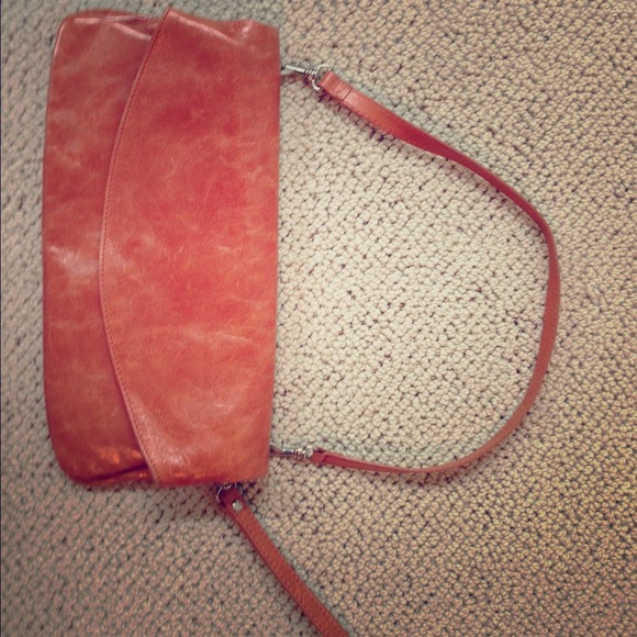 Leather clutch, rust color, bought at Nordstrom