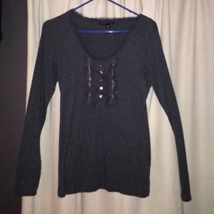 Ruffled grey long sleeve.