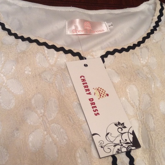 A beautiful creamy dress with string as in pic - Picture 2 of 3