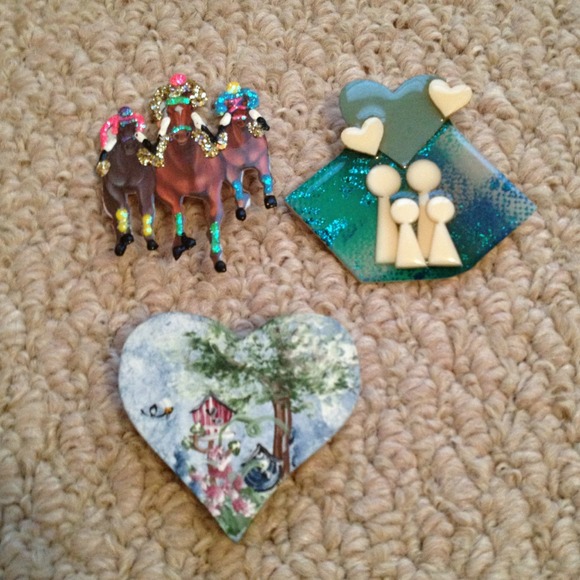 Three vintage hand made pins