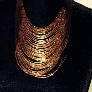 Brown, yellow and gold necklace.