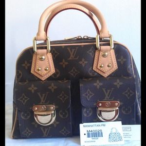 SOLD/LAYAWAY!!!!New LVNever Used Manhattan PM