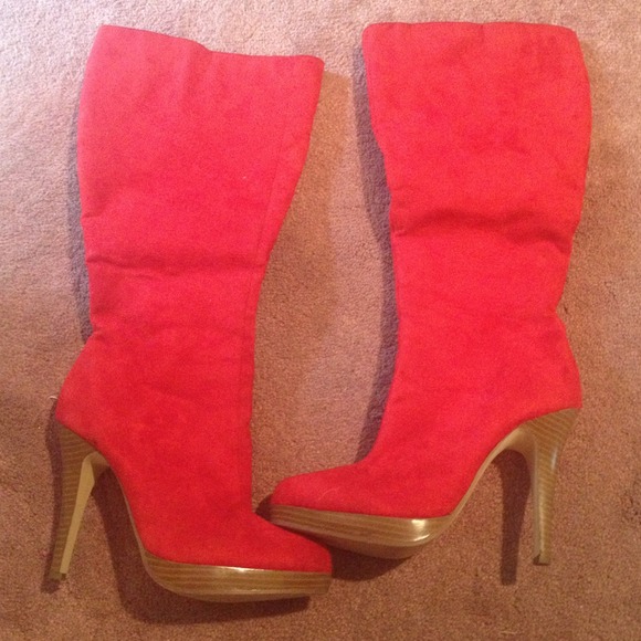 Red suede boots with tan heel