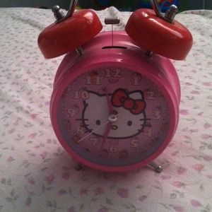 cute old fashioned hello kitty clock(: