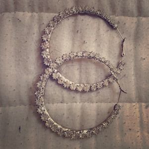 Large stone'd hoops and BB wife earrings.