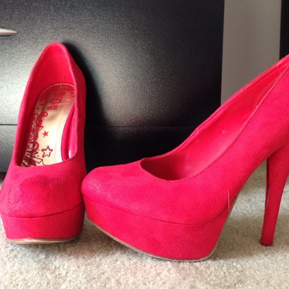 Suede red heels.