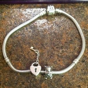 Authentic pandora bracelet & 2 charms