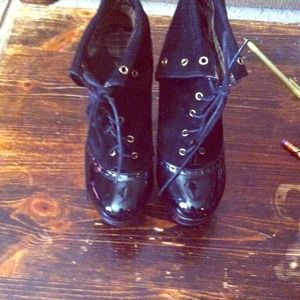 Black patent and suede shoe string ankle boots