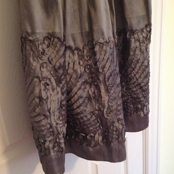 Black dress with grey embellishment on the bottom