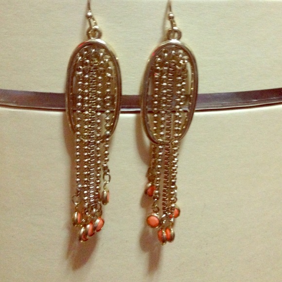 Jewelry - Never worn brand new gold color earring.