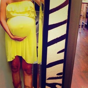 A yellow dress I wore it for my pregnancy.