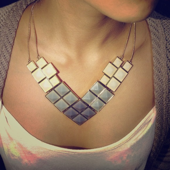 Grey with golden base triangle necklace