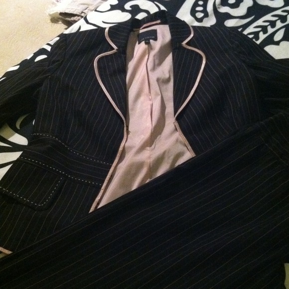 Pink/Black Express Suit. Bought it & too small:(