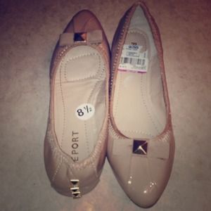 Report tan flats! Very cute bought but never worn.
