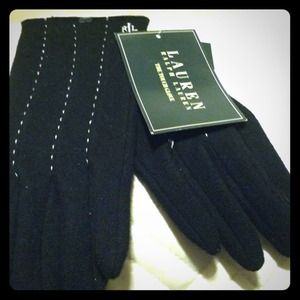 Black driving gloves with white stitching