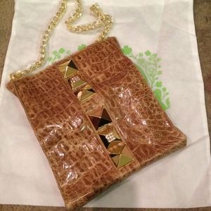 Charm and luck convertible leather brown clutch