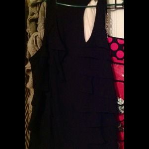 Ruffle razorback black top