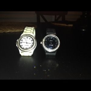 Two Geneva rubber and crystal bezel watches.