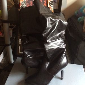 Black heeled boots. Size 9.