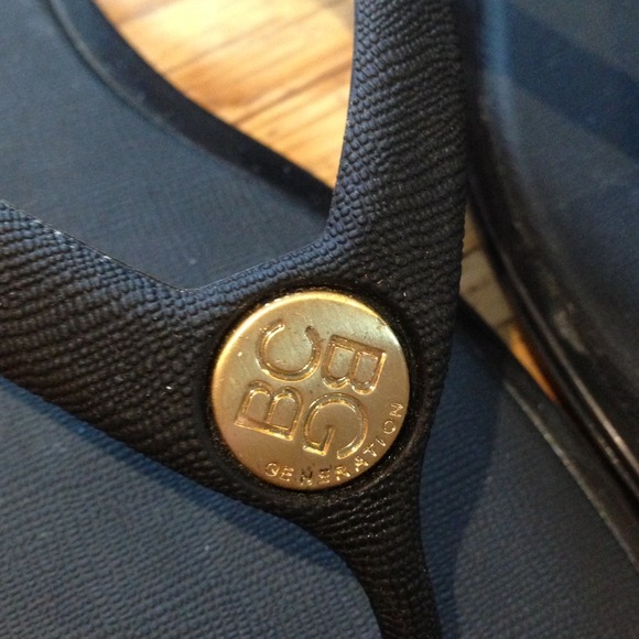 SOLD: BCBGenerarion Black Flip Flops W/ gold logo - Picture 3 of 4