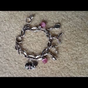 Beautiful fashion bracelet, shopping chick theme.