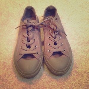 Gray low top Chuck Taylor's.