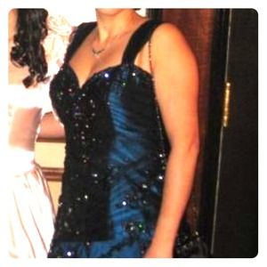 A beautiful metallic/dark blue full length gown